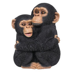 Figura decorativa che abbraccia gli scimpanzé